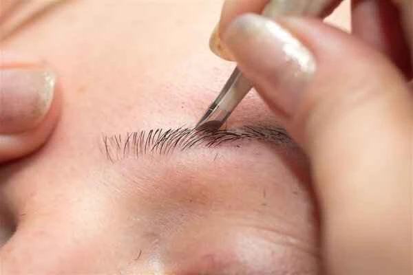 How to remove eyebrow scars?